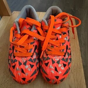 Kids Orange Patterned Cleats